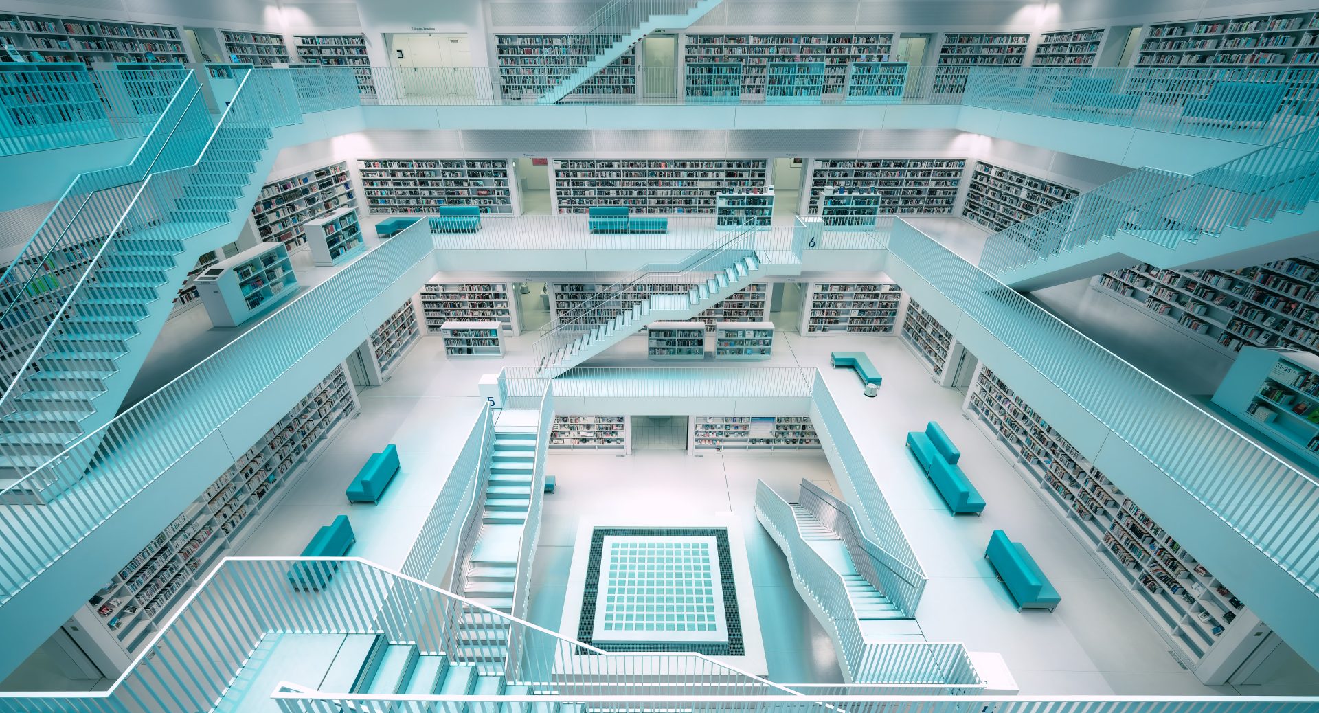 zpq1dg 6144×3321 Stefan Zimmermann cyan books table couch